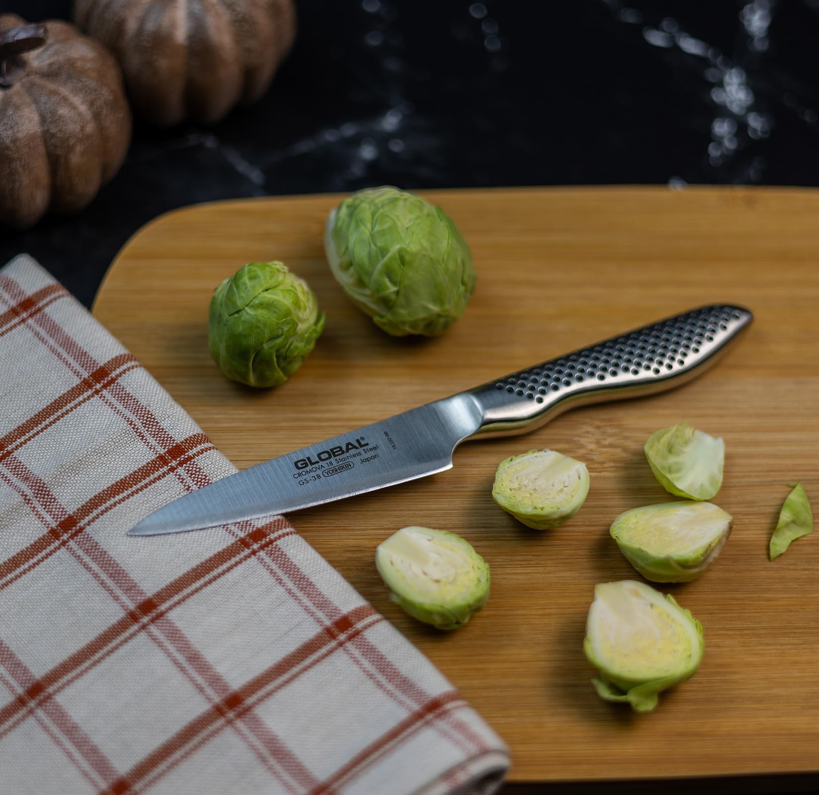 Global 3 Piece Knife Set - 7 inch Hollow Ground Santoku, 5 inch Utility, 3 1/2 Paring, Lightweight Japanese Stainless Steel, Razor Sharp Edge, Made in Japan, G-80338 - Image 6